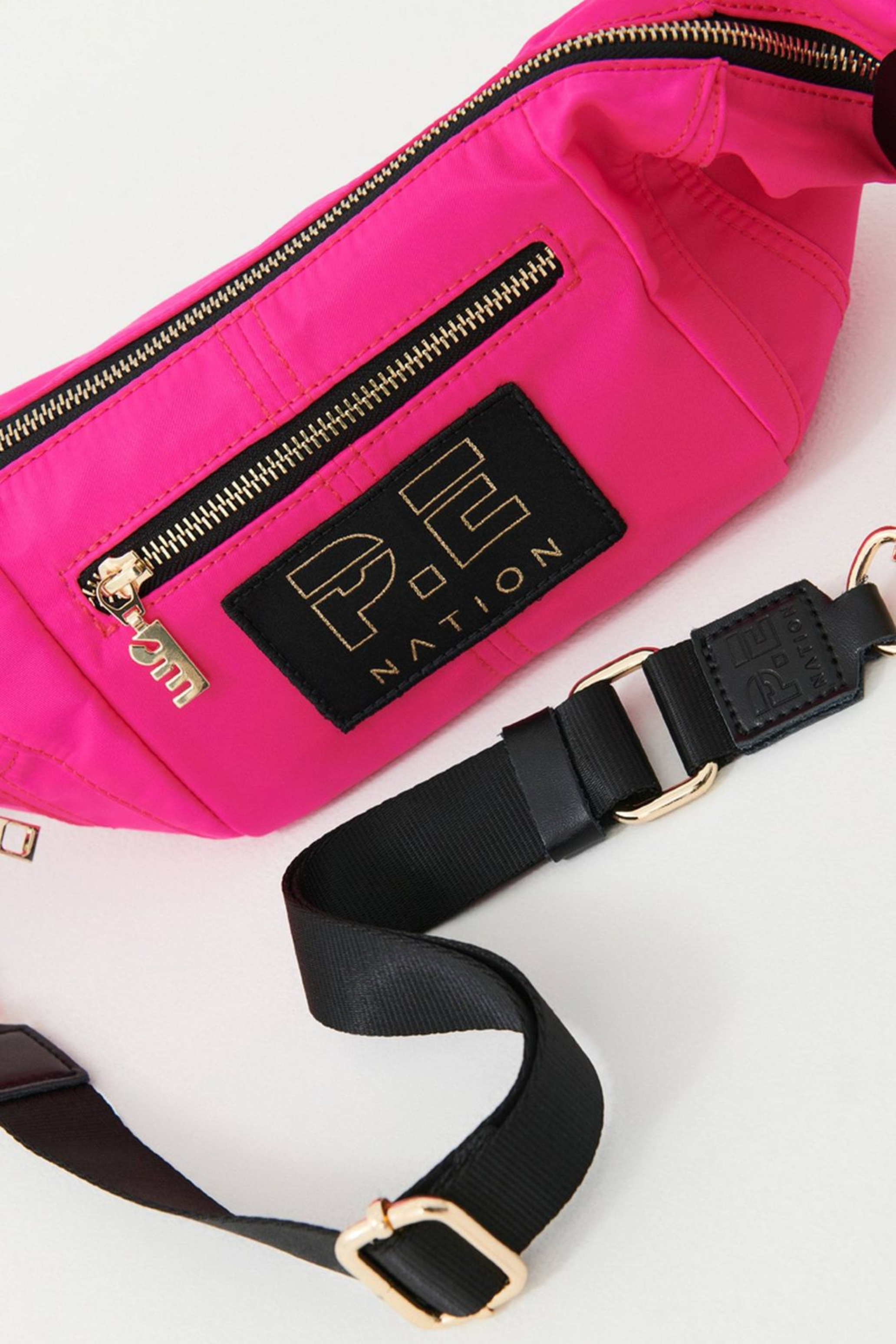 Shop Diva pink Mini Fast Lap Cross Body by PE NATION online Tribe71